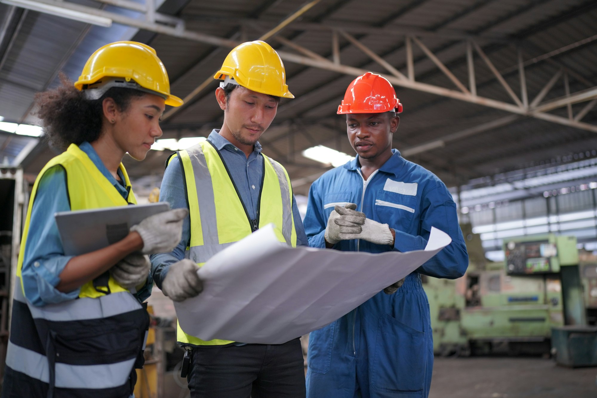 Factory Engineer Operating machines in industry factory.