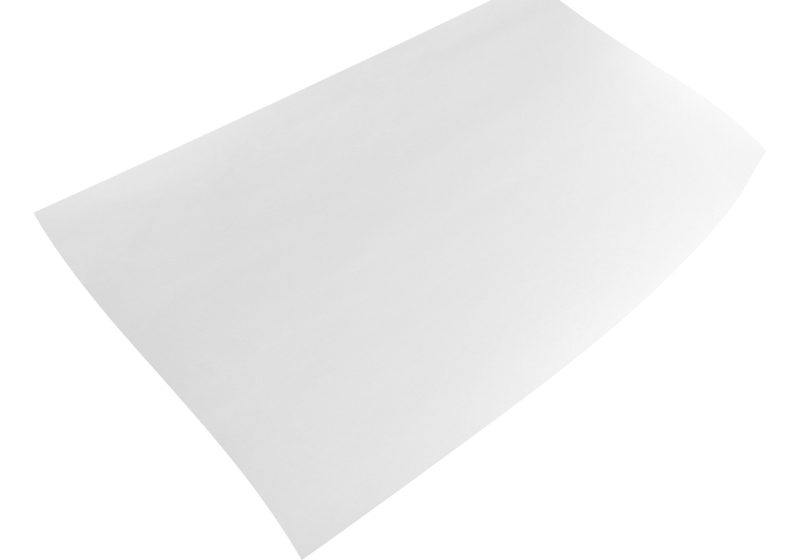 close up of flying papers on white background